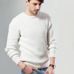 Portrait of young handsome man posing in studio